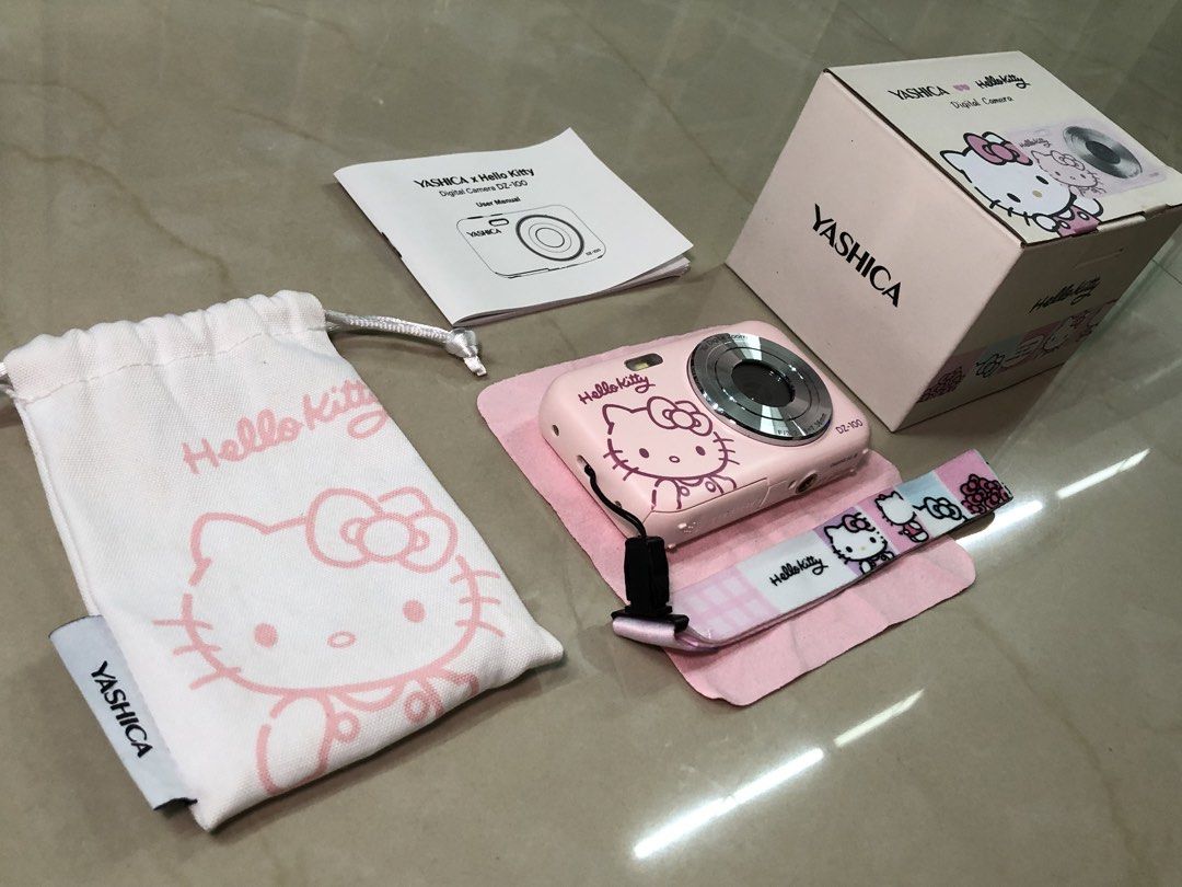 HELLO KITTY DIGICAM (Category: Cameras) located in Manila. Submitted by hayaxsint (Listing ID 1467818943, Image 2). Description: 🩷 HELLO KITTY DIGICAM 🩷 inclusions: - digicam - wrist strap - box - pouch - lens cloth no dents, minor scratches only on the silver part. see pictures. all in good condition 💓 location: QC MOP: gcash/maribank/gotyme MOD: lalamove/J&T meet up: Ever Commonwealth/SM North/Trinoma/SM Fairview/Fairview Terraces rfs: di na