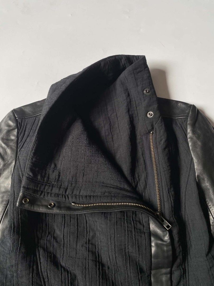 Helmut Lang Blizzard (Category: Coats, Jackets and Outerwear) located in Baguio. Submitted by dapper_deals (Listing ID 1467692757, Image 2). Description: Helmut Lang Blizzard Asymmetrical Leather - Trimmed knit jacket Dimentions: Length - 25 Width - 18 Shoulder - 16 Sleeves - 23.