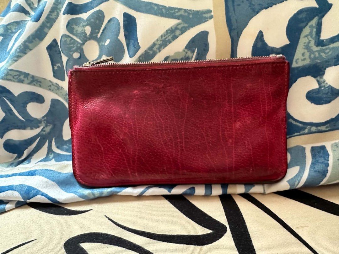 Hermès Pink Leather Zip Pouch (Category: Purses & Pouches) located in Caloocan City. Submitted by prelovebyoreo (Listing ID 1467609177, Image 2). Description: Needs clean - 100% Authentic Hermès zip pouch in vibrant bright pink grained leather - Crafted in France featuring silver-tone hardware with Hermès branding - Clean interior lining complete with the iconic heat-stamped logo - Compact and versatile size, ideal for cards, cash, or small essen