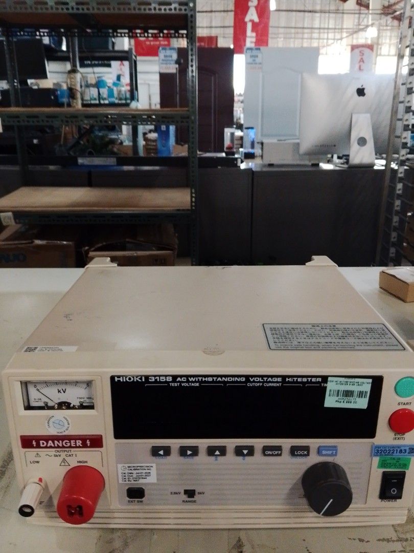 Hioki 3158 AC Withstanding Voltage HiTester (Category: Construction Tools & Equipment) located in Manila. Submitted by jlyn14 (Listing ID 1467656296, Image 1). Description: - Model: Hioki 3158 AC Withstanding Voltage HiTester - Type: Heavy-duty laboratory test equipment - Display: Analog kV meter on the left and a large central digital display panel - Controls: Push buttons for load, save, arrows, on/off, lock, and shift - Operation: Large rotary