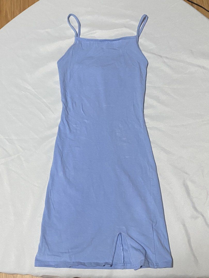 H&M Divided Basic Light Blue Spaghetti Strap Dress XS (Category: Dresses) located in Paranaque City. Submitted by pomeloluvr (Listing ID 1467685857, Image 1). Description: - Brand: H&M Divided Basic - Size: XS - Color: Light Blue - Material: Soft knit fabric - Fit: Bodycon style - Details: Spaghetti straps, square neckline, small front slit at hem - Condition: Clean tag, minimal wear - Style Tip: Great basic piece for warm weather layering.
