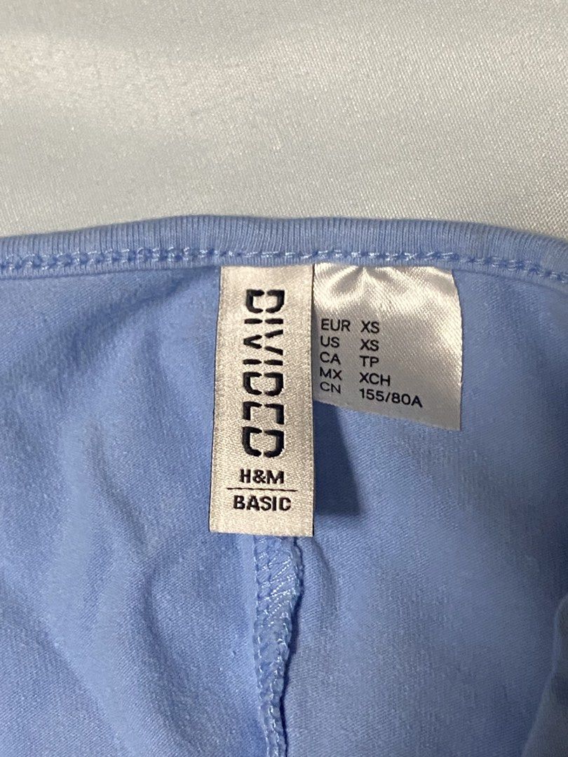 H&M Divided Basic Light Blue Spaghetti Strap Dress XS (Category: Dresses) located in Paranaque City. Submitted by pomeloluvr (Listing ID 1467685857, Image 3). Description: - Brand: H&M Divided Basic - Size: XS - Color: Light Blue - Material: Soft knit fabric - Fit: Bodycon style - Details: Spaghetti straps, square neckline, small front slit at hem - Condition: Clean tag, minimal wear - Style Tip: Great basic piece for warm weather layering.
