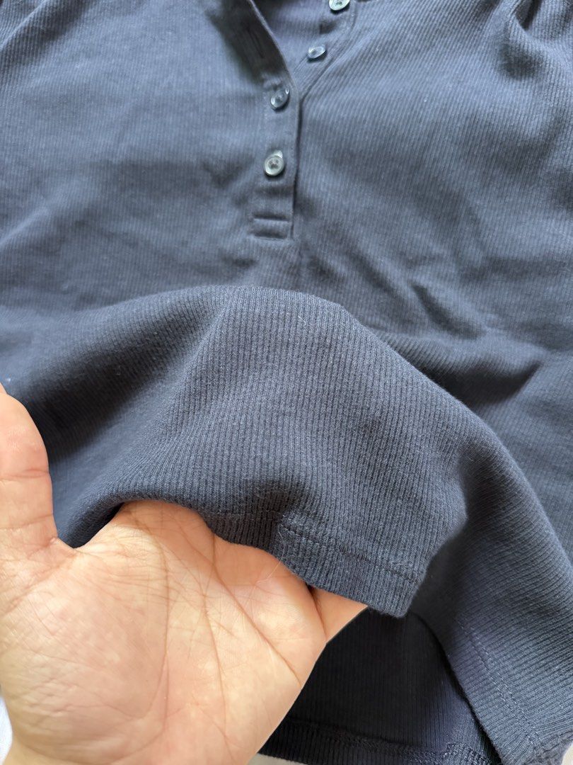 H&M Divided Black Ribbed Crop Top Polo (Category: Shirts) located in Las Pinas. Submitted by ann.co. (Listing ID 1467745194, Image 3). Description: - Brand: H&M Divided - Item: Ribbed Crop Top - Color: Black - Size: XL - Material: Stretchy cotton knit - Features: Short sleeves, collar, front button placket - Condition: Worn a few times, great shape - Style Tip: Easy to pair with high-waisted jeans or skirts.
