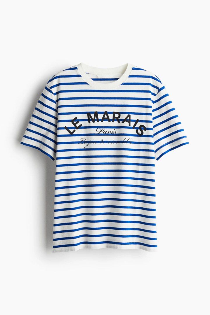 H&M Le Marais Paris blue white striped cotton round neck basic oversized top (Category: Shirts) located in Makati City. Submitted by closetsquad (Listing ID 1467794896, Image 1). Description: ☀️BRAND NEW! Never worn! 🏝️Measurements posted; NO when worn 🪸Discounts if buying 2 or more items! 🧜🏻‍♀️RFS: Wrong size; Need funds for my cat 🌺 NO returns/NO refunds/NO swaps 💸 MOP: BPI/GCASH only 🚚 SF: 95 MM/120 GMM & LUZ/150 VISMIN 🛵 NO picking of