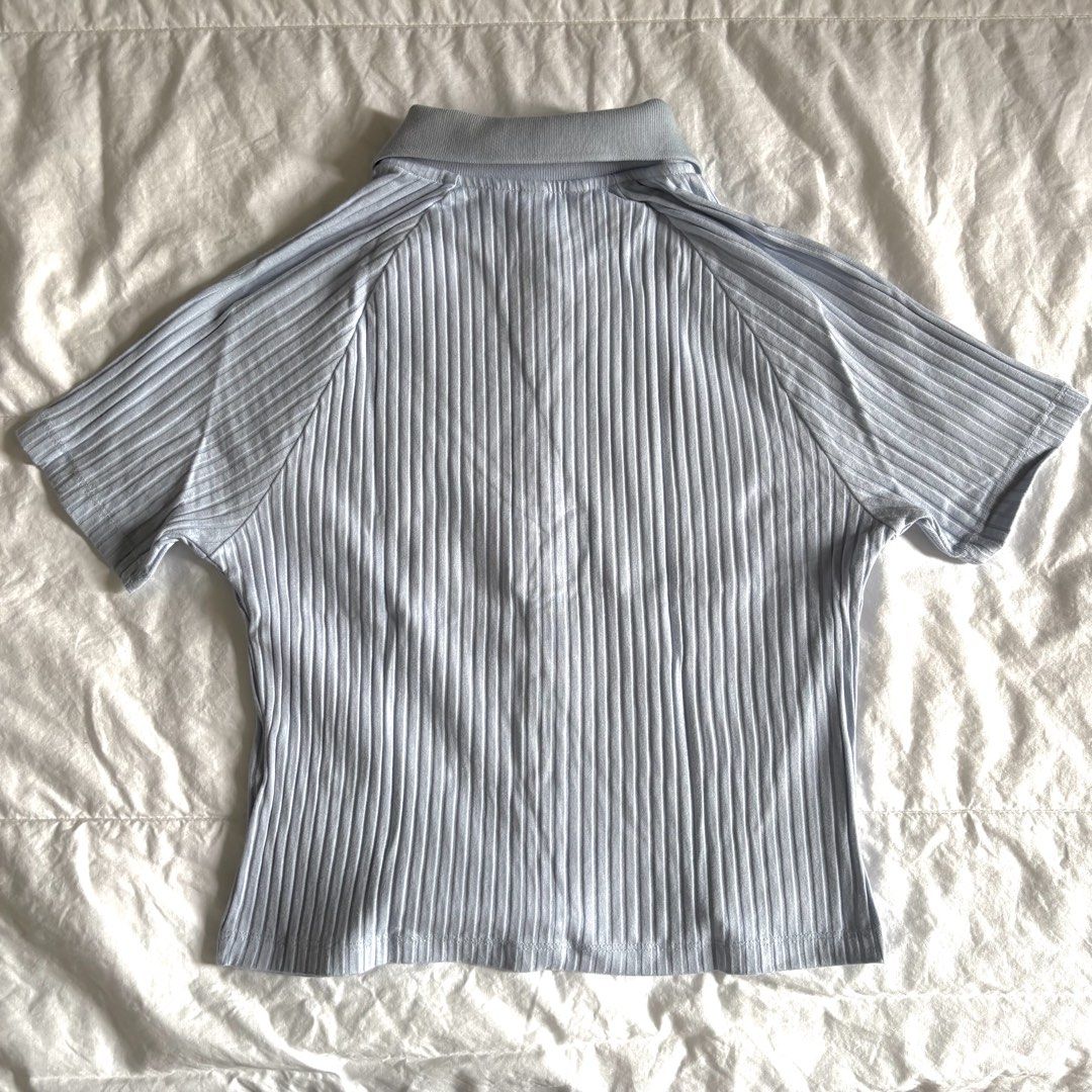 H&M Light Blue Ribbed Polo Shirt (Category: Shirts) located in Manila. Submitted by kndsccart (Listing ID 1467648463, Image 2). Description: used twice still in excellent condition mop: bpi/gcash mod: j&t, grab/lalamove shipping fr manila.