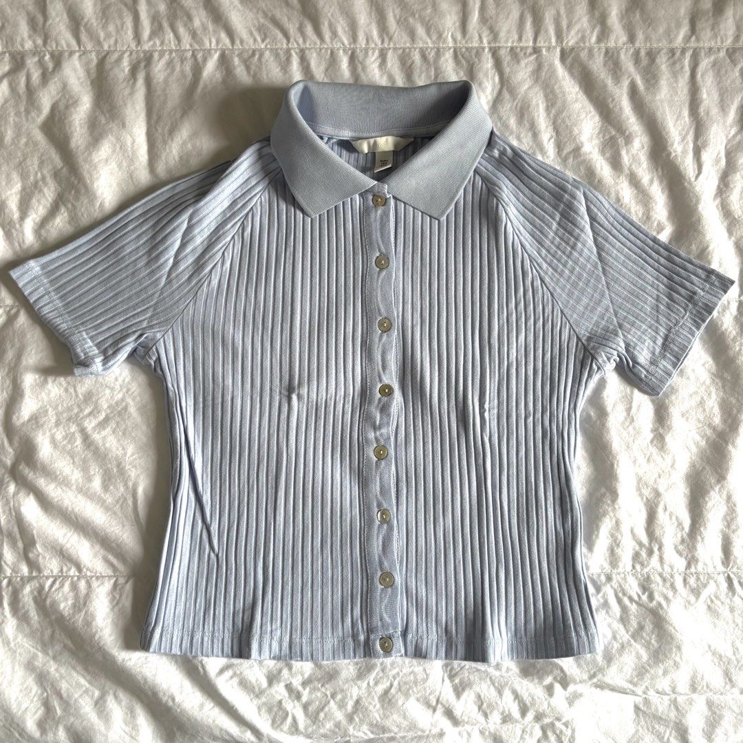 H&M Light Blue Ribbed Polo Shirt (Category: Shirts) located in Manila. Submitted by kndsccart (Listing ID 1467648463, Image 1). Description: used twice still in excellent condition mop: bpi/gcash mod: j&t, grab/lalamove shipping fr manila.