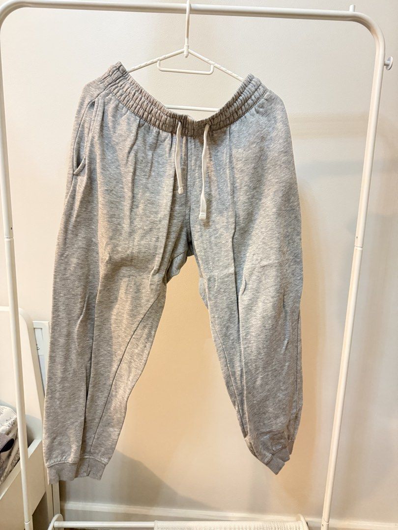 H&M Regular Fit Grey Sweatpants Joggers Size S (Category: Joggers) located in Manila. Submitted by strawberryfriends (Listing ID 1467654222, Image 1). Description: - Brand: H&M - Size: Small (EUR S / US S) - Fit: Regular fit with comfortable elastic waistband and white drawstring - Features: Practical side pockets and stylish ribbed ankle cuffs - Material: Soft cotton, polyester, and viscose blend - Condition: Great for everyday casual wear and l