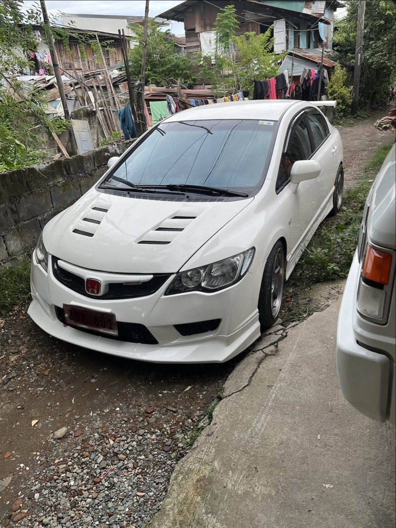 Honda Civic 1.8 Manual (Category: Used Cars) located in Calumpit. Submitted by chinolouie (Listing ID 1467647184, Image 1). Description: 🔥 2007 HONDA CIVIC 1.8V FD — MTR INSPIRED! 🔥 💎 FULLY LOADED | CLEAN SETUP | READY TO DRIVE INTERIOR & FEATURES • Bride Bucket Seat • Push Start by Car Professor • MOMO Steering Wheel • Alpine 2-DIN Head Unit • Greddy Gauges: * Vacuum * Volt * Oil Temperature * Oil Pressure * Water Temperature * Carbon Sidings