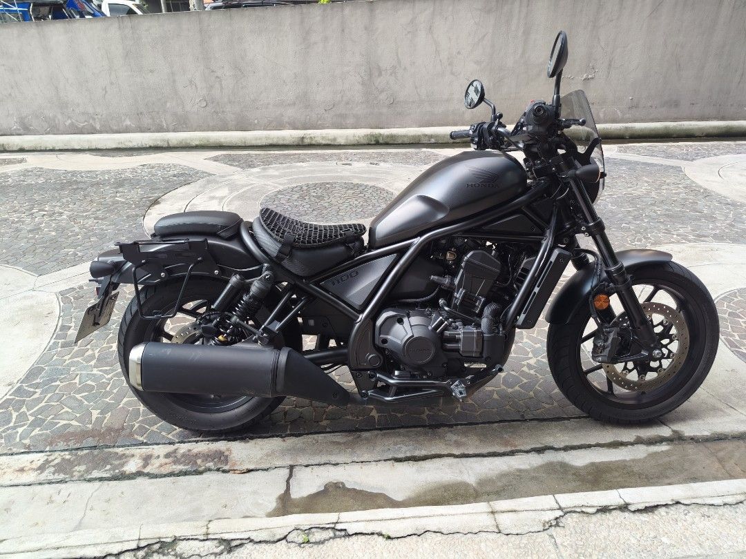 Honda Rebel 1100 DCT (Category: Motorbikes for Sale) located in Mandaluyong City. Submitted by ryancab2026 (Listing ID 1467730978, Image 2). Description: Honda Rebel 1100 cruiser motorcycle. 12xxx km Matte black finish throughout. Puig windshield rear luggage rack mount Clean bodywork, well maintained. No to open deed of sale.