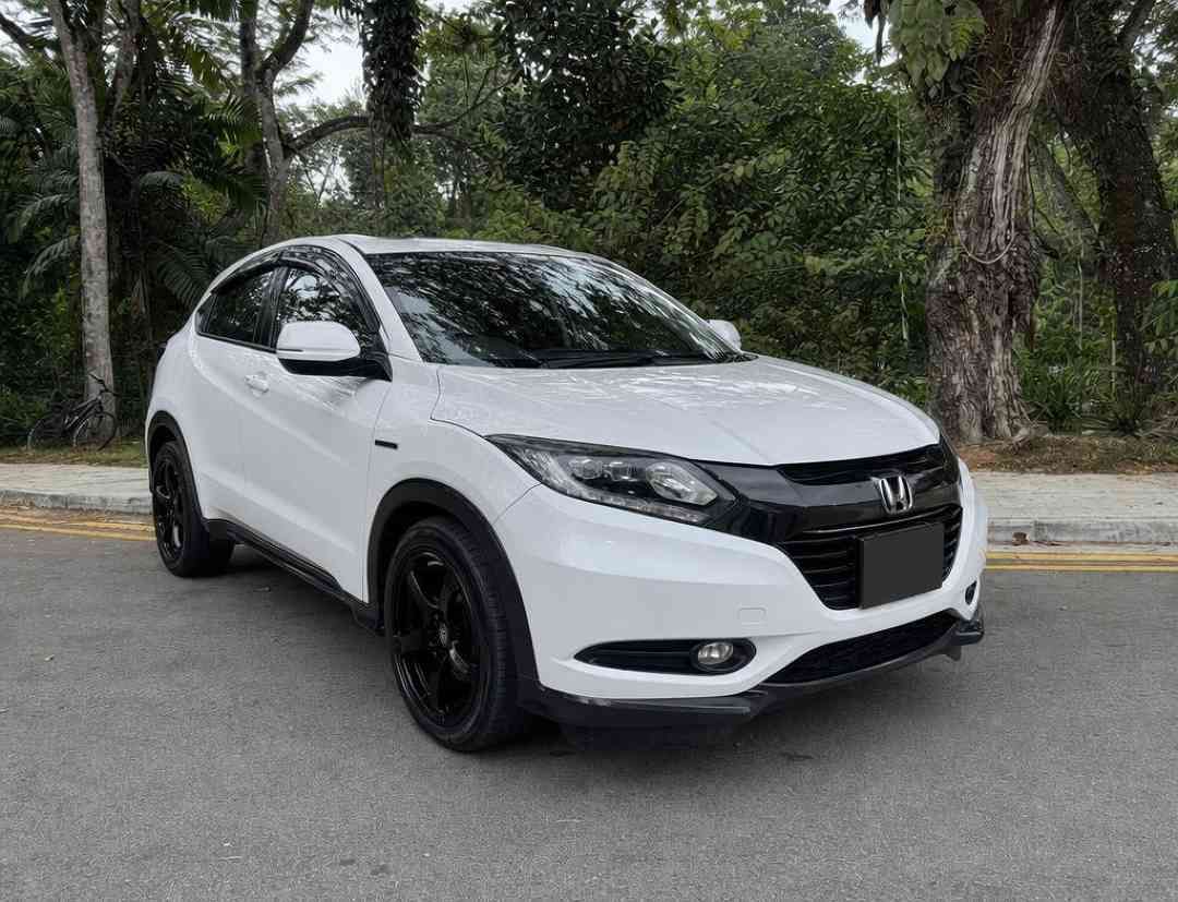 Honda Vezel Hybrid 1.5 X [2016 FL] (A) (Category: Used Cars) located in Singapore. Submitted by carousell_certified_partners (Listing ID 1466042664, Image 1). Description: Comes with engine/gearbox/Hybrid battery warranty till end of drive! Equipped with Advan TC4 rims, 18'' tyres. Non PHV unit! 100% quality buy! Very well maintained by previous owner, fuel efficient and low maintenance with cheap road tax. Flexible financing available with high 