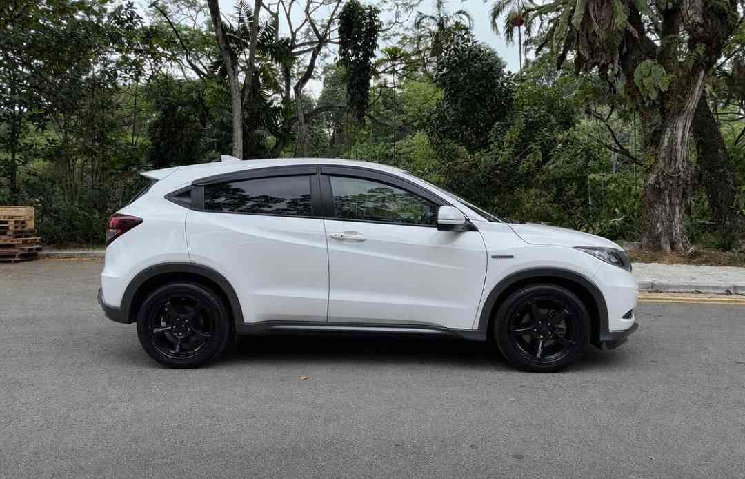 Honda Vezel Hybrid 1.5 X [2016 FL] (A) (Category: Used Cars) located in Singapore. Submitted by carousell_certified_partners (Listing ID 1466042664, Image 2). Description: Comes with engine/gearbox/Hybrid battery warranty till end of drive! Equipped with Advan TC4 rims, 18'' tyres. Non PHV unit! 100% quality buy! Very well maintained by previous owner, fuel efficient and low maintenance with cheap road tax. Flexible financing available with high 