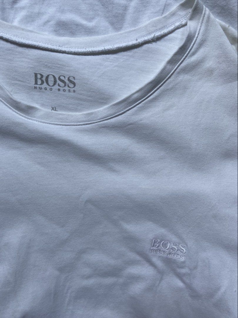 Hugo boss plain white shirt (Category: Tshirts & Polo Shirts ) located in Panabo. Submitted by thrifty.red (Listing ID 1467614580, Image 2). Description: width:21.5 length:30 Excellent Condition need wash .