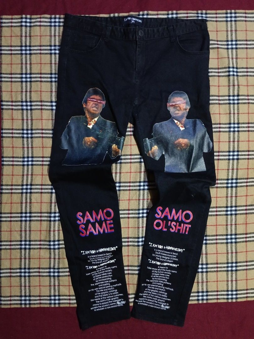 I Am Not A Human Being Graphic Black Jeans (Category: Jeans) located in General Santos City (Dadiangas). Submitted by freehorse.5f2a61 (Listing ID 1467651576, Image 1). Description: - Brand: I Am Not A Human Being - Item: Black Denim Jeans - Size: 34 - Material: 98% Cotton, 2% Polyurethane (Made in Korea) - Design details: Graphic prints on front thighs, text prints on lower legs, and D-ring on back pocket - Authenticity: Includes branded buttons