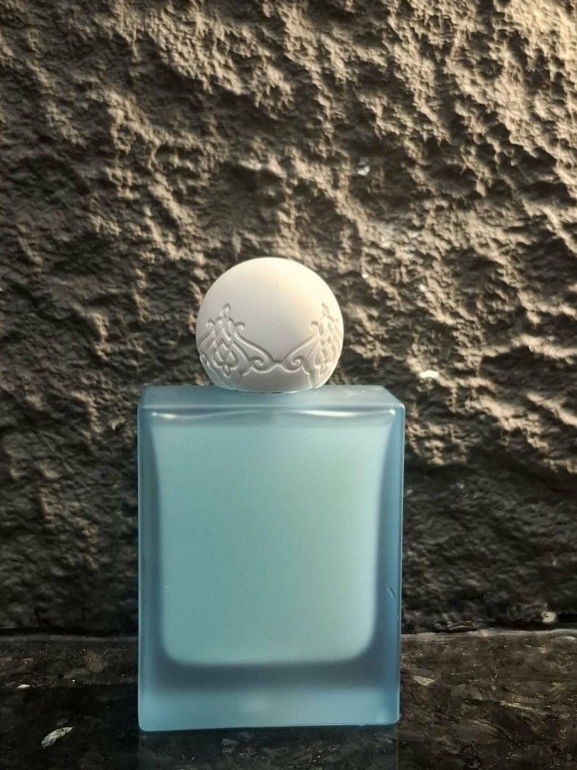 IBRAQ Pearl Powder Eau De Parfum (Category: Fragrance & Deodorants) located in Taytay. Submitted by my3gummieshop (Listing ID 1467633081, Image 2). Description: - Brand: IBRAQ Pearl Powder - Type: Eau de Parfum (EDP) Spray - Size: 75ml - Condition: Unused with original box (batch & production details shown) - Bottle Design: Frosted blue glass with Arabic calligraphy and ornate round white cap - Origin: Made in KSA.