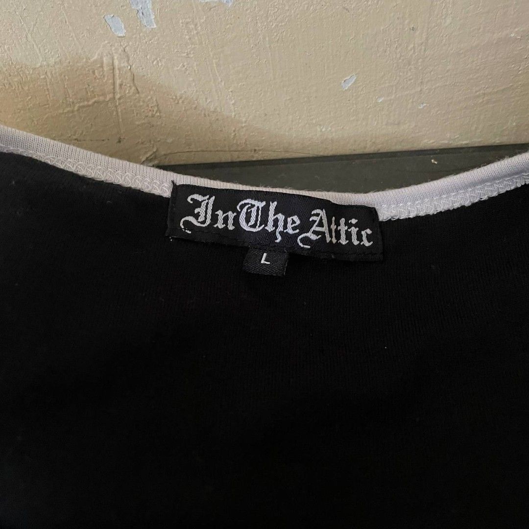 In The Attic poem tee (Category: Shirts) located in Davao. Submitted by knthrftfnds_3704 (Listing ID 1467664543, Image 2). Description: In the attic poem tee Width-19 Length front-26 Excellent condition No issue Already washed Ready to wear Hearing offers 🙏.