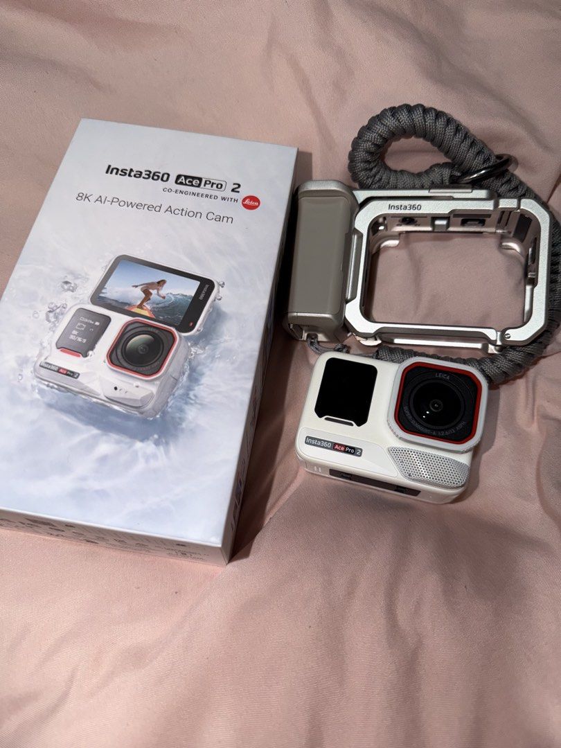 Insta360 Ace Pro 2 Explorer Bundle (Category: Video Cameras) located in Iloilo. Submitted by kpophoe (Listing ID 1467813855, Image 1). Description: - Item: Insta360 Ace Pro 2 (White) - Condition: used with minimal scratch 9/10 - Key Features: Co-engineered with Leica, captures sharp 8K footage - Inclusions: Original box, charger, and grip - Proof of Purchase: Includes original receipt dated December 2025 (blurred out for security purposes. Can pr