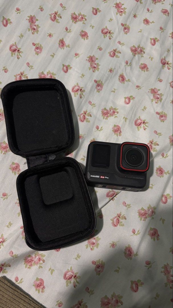 Insta360 Ace Pro Action Camera with Case (Category: Cameras) located in La Trinidad. Submitted by caicai1926 (Listing ID 1467666838, Image 1). Description: - Model: Insta360 Ace Pro (Black) with Leica lens - Condition: Fully functional, great working order, ready for use - Includes: Black zippered protective case - Special Note: Flip-up screen still has the original care instructions sticker attached - Ideal For: Capturing adventures, sports, and