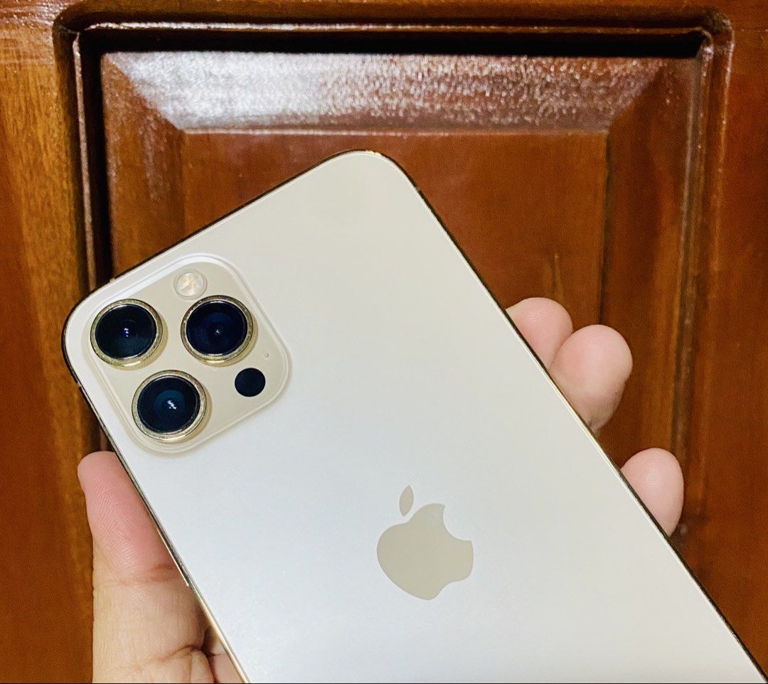 IPHONE 12 PROMAX 256GB (Category: iPhone 12 Series) located in Castillejos. Submitted by aprilynreyes_061123 (Listing ID 1467679062, Image 2). Description: 🍎 FOR SALE: iPhone 12 PRO MAX 256GB Gold ✨ Elegant Gold — premium look, sulit storage! 🤎 ✅ 256GB Storage ✅ 100% Battery Health ✅ Factory Unlocked — Any SIM ✅ Original Display ✅ Original Battery ✅ No History of Repair ✅ Face ID Working 📦 With Replacement Box 🎁 FREE 3 PHONE CASES 🔌 With Cha