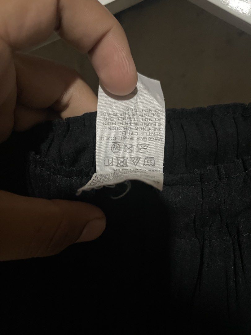 ISSEY MIYAKE ME Pleated Black (Category: Other Bottoms) located in Davao. Submitted by houkaygoods (Listing ID 1467633191, Image 3). Description: - 100% Authentic Issey Miyake Me pleated black pants - Made in Japan with signature permanent pleats - Comfortable elastic waistband for an easy fit - Lightweight, travel-friendly polyester material - Classic standard straight-leg cut - Easy care: machine washable on gentle cycle.