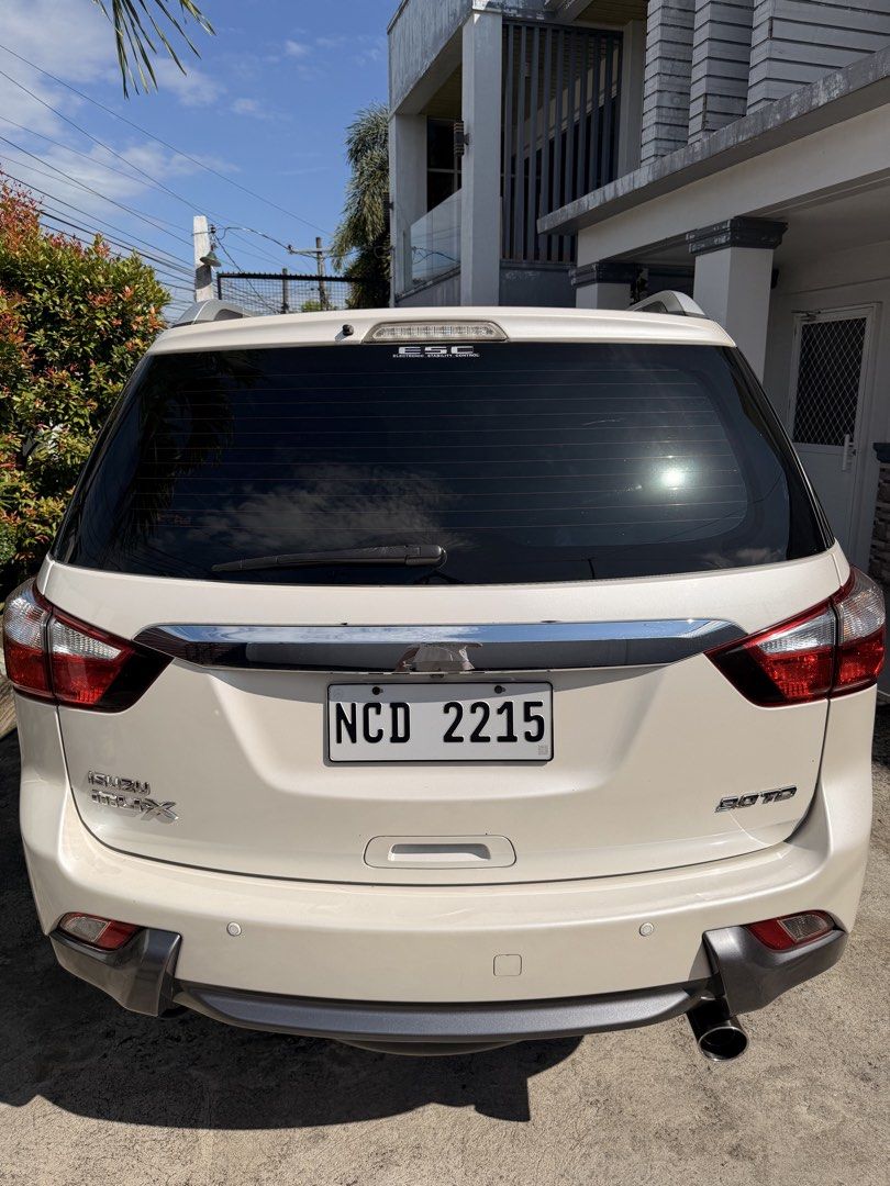 Isuzu Mu-X (Category: Used Cars) located in Makati City. Submitted by raiinnn. (Listing ID 1467627139, Image 3). Description: FOR SALE: 2016 ISUZU MU-X LS-A 3.0L Vehicle Details: Year Model: 2016 Model: MU-X LS-A 3.0L (Top-of-the-Line) Transmission: Automatic Mileage: 130k+ Color: Pearl First Owner LTO/HPG Verified No Issues Complete Documents Price: ₱700,000 negotiable For inquiries please send me a private message..