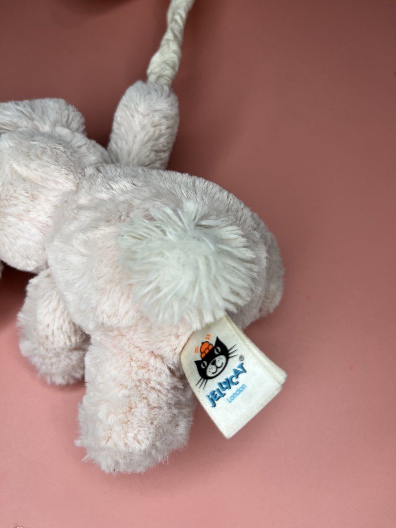Jellycat Bunny Plush Toy with Star (Category: Plushies & Soft Toys) located in Caloocan City. Submitted by snapshop_ph (Listing ID 1467645155, Image 3). Description: - Authentic Jellycat London bunny plush toy - Adorable design featuring the bunny holding a fluffy white star - Crafted with super soft pink fur, long ears, and a fluffy white tail - Includes a handy hanging loop at the top of the star - Brand new with authentic tags attached - Ideal