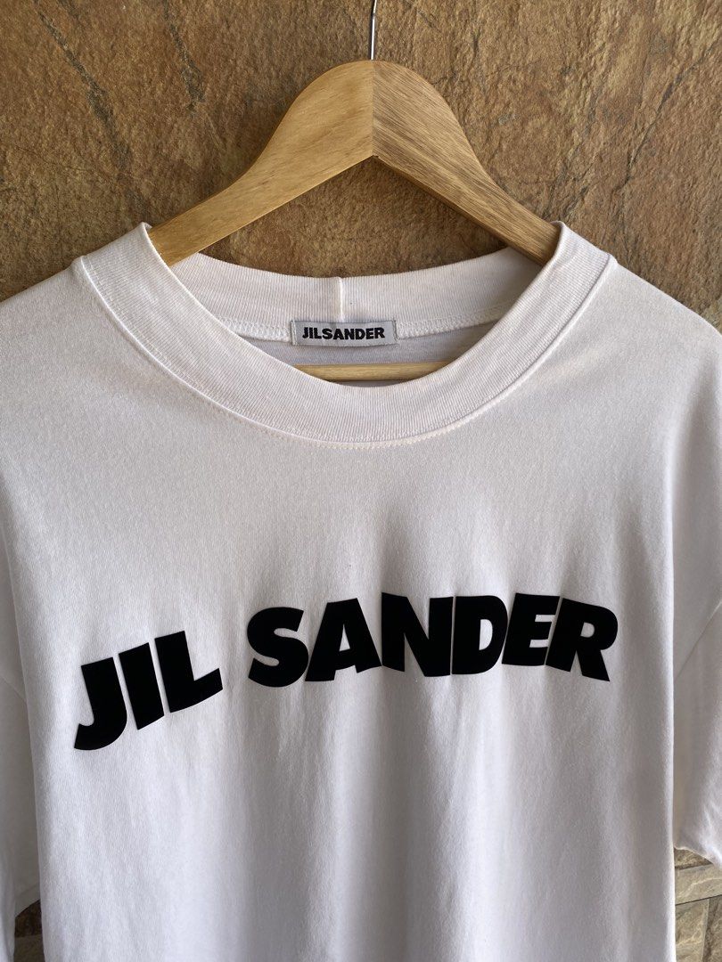 JIL SANDER - “ RUBBERIZE SPELL OUT LOGO “ DESIGN TSHIRT (Category: Tshirts & Polo Shirts ) located in Bacolod City. Submitted by timelessbyjosh (Listing ID 1467698152, Image 2). Description: BEST FOR CASUAL & STREETWEAR OUTFITS SIZE : ACTUAL COLOR : WHITE COLOR RATE : 10 OUT OF 10 CONDITION : NEAR NEW MATERIAL : MADE IN : ITALY FLAWS : NONE DIMENSIONS LENGTH - 29 WIDTH - 20. 5 BEST FIT MEDIUM TO LARGE MEASUREMENT TAKEN WHILE LAYING FLAT. PLEASE C