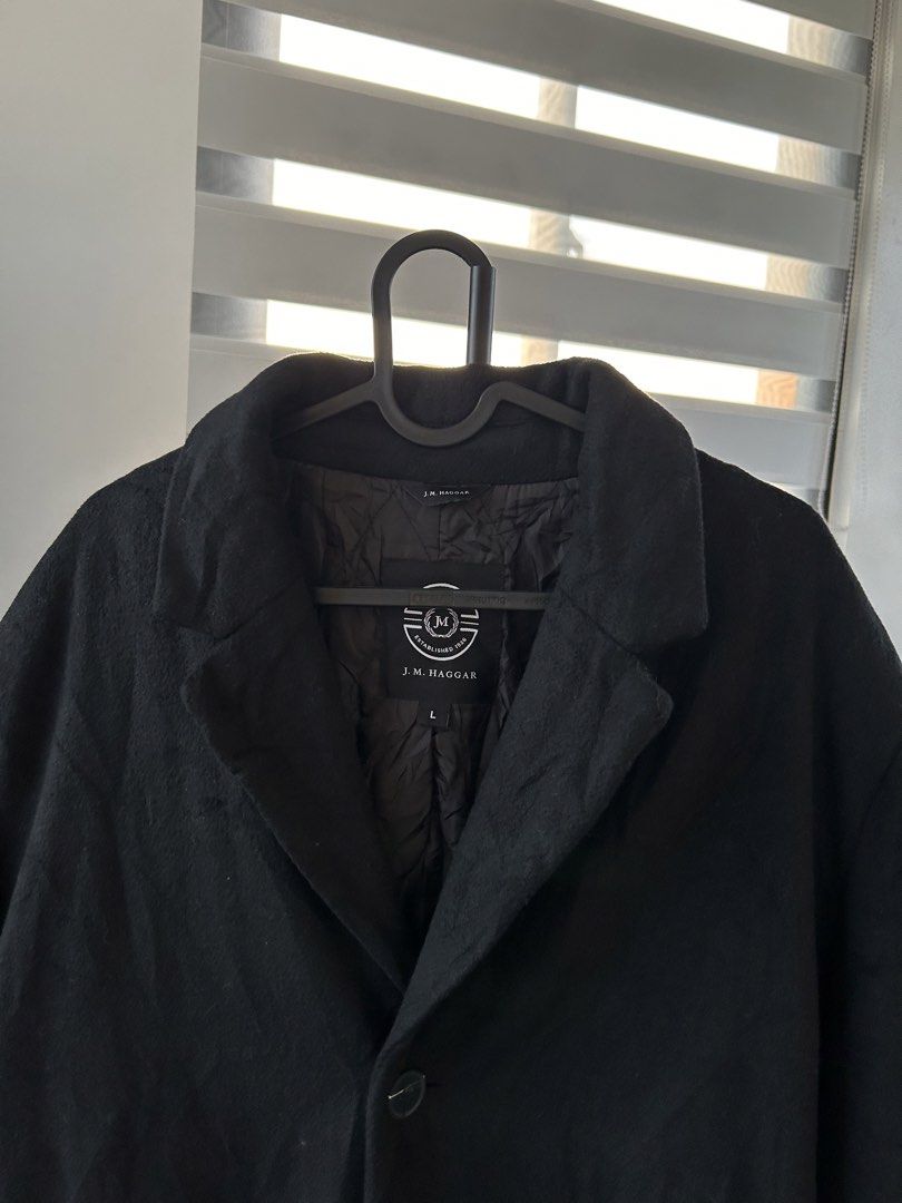 J.M. Haggar Black Wool Top Coat (L) (Category: Coats, Jackets and Outerwear) located in Dasmarinas. Submitted by sfclosetcleanup (Listing ID 1467693708, Image 3). Description: 17 x 37 Not heavy. :) .