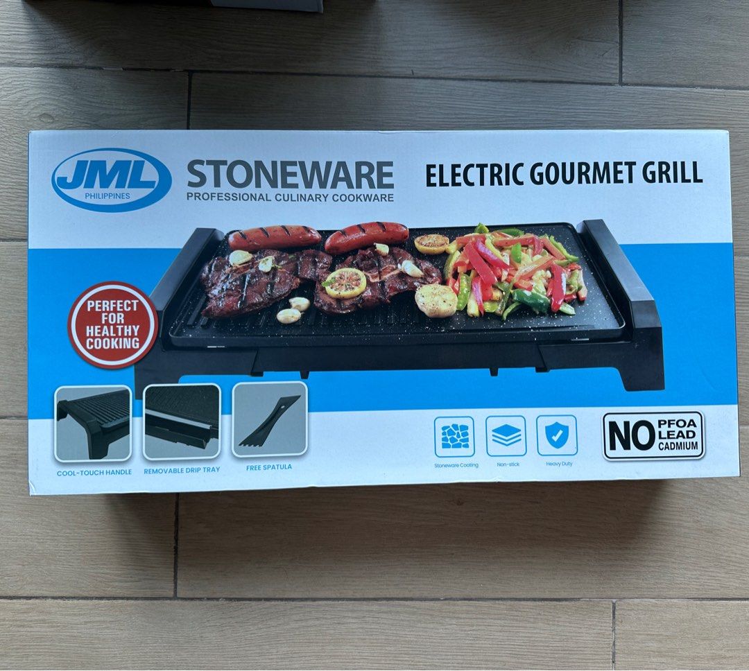 JML Stoneware Electric Gourmet Grill (Category: BBQ, Grills & Hotpots) located in Taguig. Submitted by preloved.by.belly (Listing ID 1467687605, Image 1). Description: * SRP: 5,099 * Unopened box * Enhanced durability and strength * 2 mm thick construction with anti-scratch surface * 2 in 1 design: Grill and Grilled Plate * Hard-stone coating is non-stick, allowing for oil-free cooking * Advanced embedded heater for fast heat-up and even heat dis