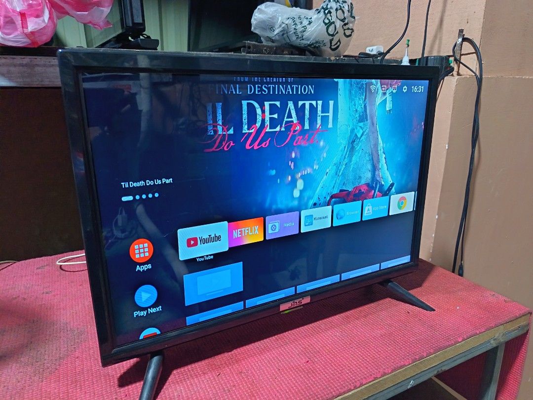 JMS Smart TV Android Television with YouTube and Netflix (Category: TV) located in Caloocan City. Submitted by princessyumie (Listing ID 1467627585, Image 2). Description: - Brand: JMS Smart TV - Condition: Good working condition - Display: Vibrant display with clear picture quality - Built-in Apps: YouTube and Netflix ready for streaming - Inclusions: remote control and stable stand legs - Ideal Use: Perfect setup for bedroom or living room Pick