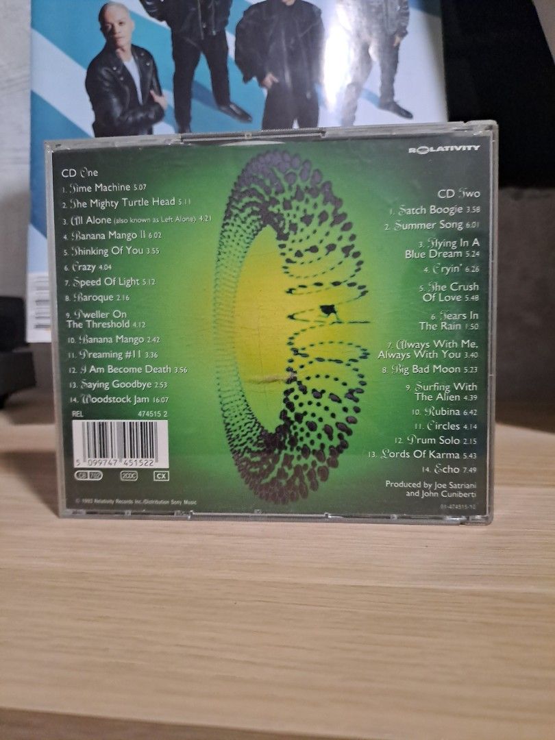 Joe Satriani Time Machine 2 CDs Album (Category: CDs & DVDs) located in Las Pinas. Submitted by cobieshop (Listing ID 1467741113, Image 2). Description: - Artist & Album: Joe Satriani - Time Machine (Double CD) - Content: Over 140 minutes of music featuring new, unreleased studio tracks and live performances - Label: Relativity Records - Packaging: Standard jewel case with tracklist on the back cover - Condition: Excellent / Great for fans and co