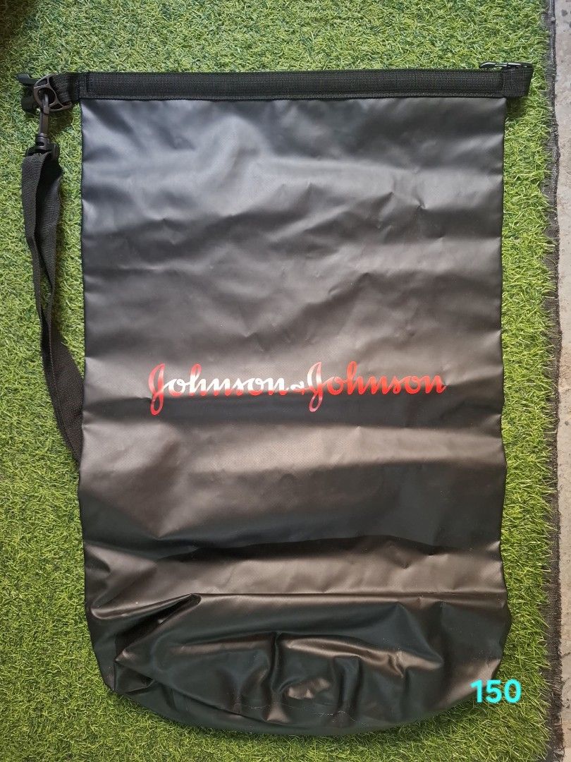 Johnson & Johnson Branded Black Waterproof Dry Bag (Category: Other Sports Equipment and Supplies) located in Pasay City. Submitted by emilia1102 (Listing ID 1467788458, Image 1). Description: - Color: Sleek black with red Johnson & Johnson logo - Material: Waterproof design with secure roll-top closure - Included: Adjustable black strap with durable clips - Best for: Outdoor activities, water sports, and travel storage.