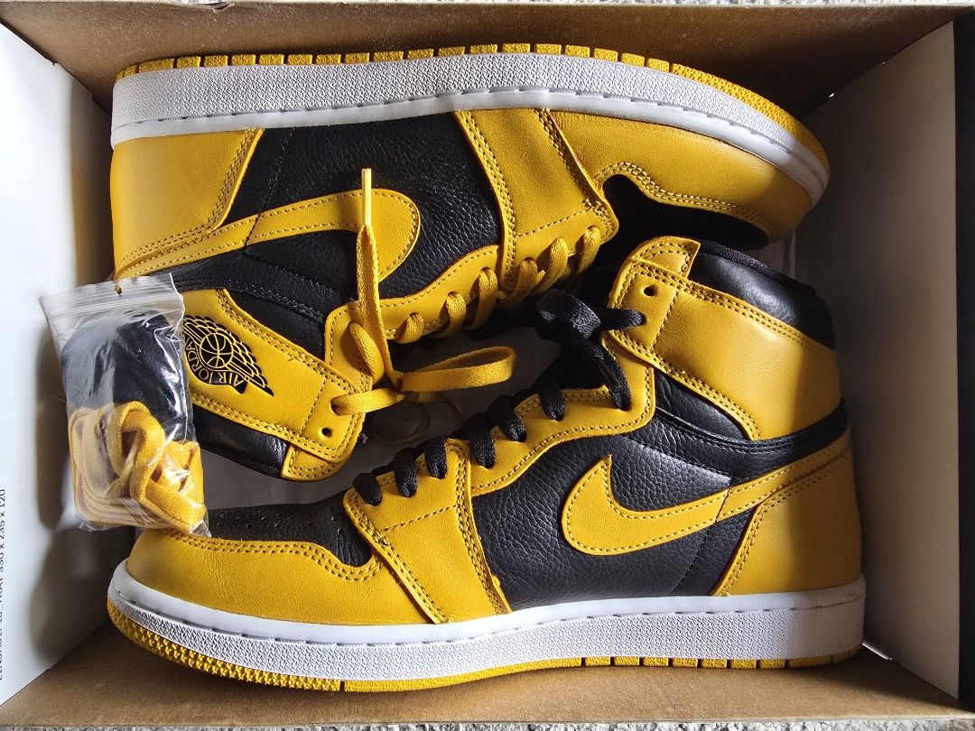 Jordan 1 High Pollen (Category: Sneakers) located in Mandaluyong City. Submitted by kob0331 (Listing ID 1467747024, Image 2). Description: - Model: Jordan 1 High Pollen - Colorway: Yellow and black leather upper with white midsole - Condition: 8/10 with small sole sep - Inclusions: Original box, extra set of laces, and original sales receipt from Rock'n'Sole Shoes and Apparels Store (dated January 2024) - Authenticity: Guaranteed original.