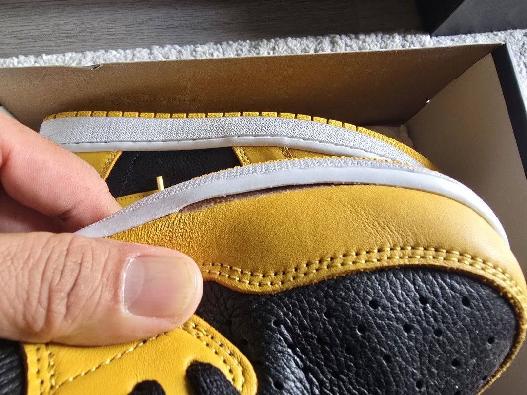 Jordan 1 High Pollen (Category: Sneakers) located in Mandaluyong City. Submitted by kob0331 (Listing ID 1467747024, Image 3). Description: - Model: Jordan 1 High Pollen - Colorway: Yellow and black leather upper with white midsole - Condition: 8/10 with small sole sep - Inclusions: Original box, extra set of laces, and original sales receipt from Rock'n'Sole Shoes and Apparels Store (dated January 2024) - Authenticity: Guaranteed original.