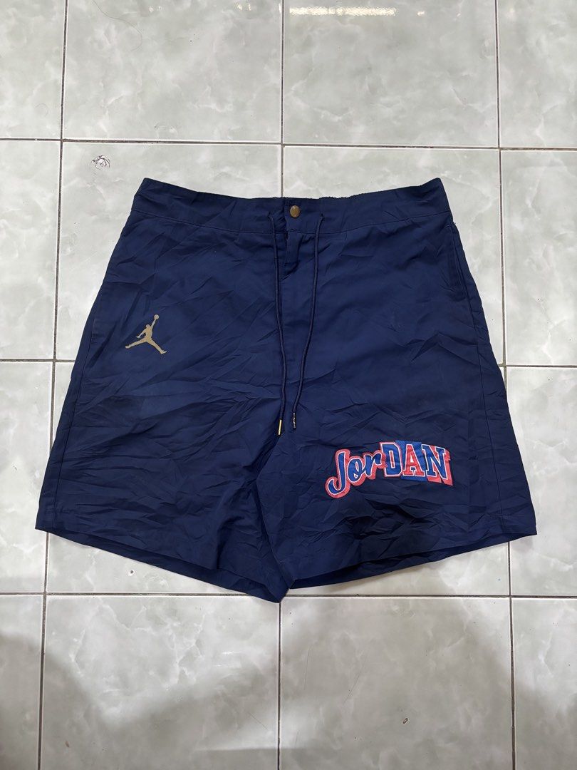 Jordan Navy Blue Shorts Size XL (Category: Shorts) located in Daraga. Submitted by hannieldustin (Listing ID 1467635094, Image 1). Description: - Brand: Jordan - Color: Navy Blue - Size: XL 34 waist 19 length - Details: Embroidered gold Jumpman logo and vintage Jordan lettering - Closure: Drawstring waistband with snap button and zipper fly - Material: 100% polyester - Origin: Made in China.
