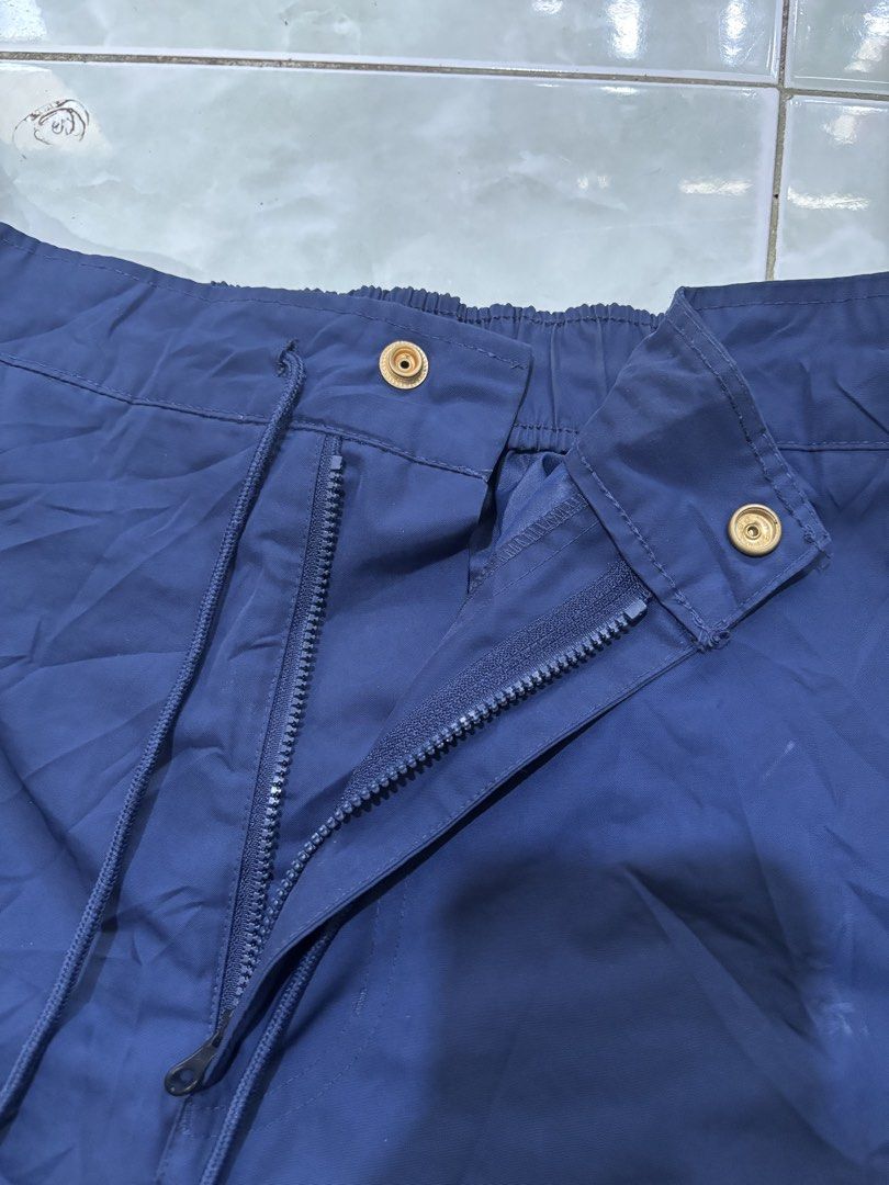 Jordan Navy Blue Shorts Size XL (Category: Shorts) located in Daraga. Submitted by hannieldustin (Listing ID 1467635094, Image 3). Description: - Brand: Jordan - Color: Navy Blue - Size: XL 34 waist 19 length - Details: Embroidered gold Jumpman logo and vintage Jordan lettering - Closure: Drawstring waistband with snap button and zipper fly - Material: 100% polyester - Origin: Made in China.