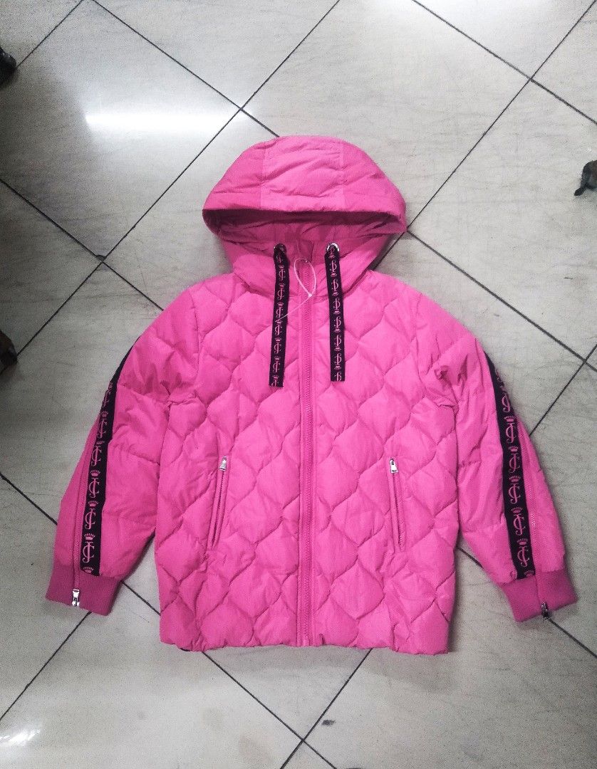 Juicy Couture Pink Puffer Jacket Size S (Category: Coats, Jackets and Outerwear) located in Manila. Submitted by jaradhiggins24 (Listing ID 1467749879, Image 1). Description: - Brand: Juicy Couture - Color: Bright Pink - Size: S - Material: 90% White Duck Down filling for ultimate warmth - Design: Diamond-quilted pattern, hooded with black branded drawstrings, and matching branded side tape down sleeves - Features: Zip-up closure and functional s