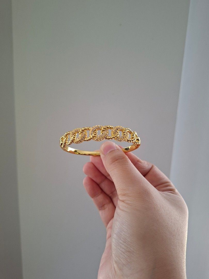 Kadena Chain Pattern Gold Stainless Steel Bangle Bracelet (Category: Bracelets) located in Dasmarinas. Submitted by danabrie22 (Listing ID 1467713979, Image 3). Description: very well-made, excellent crafstmanship 10/10 condition brand new stainless steel & colored cubic zirconia stones made in Hongkong.