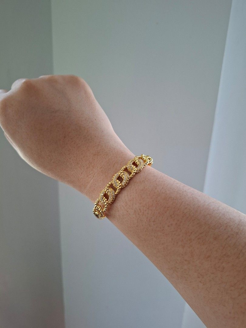 Kadena Chain Pattern Gold Stainless Steel Bangle Bracelet (Category: Bracelets) located in Dasmarinas. Submitted by danabrie22 (Listing ID 1467713979, Image 2). Description: very well-made, excellent crafstmanship 10/10 condition brand new stainless steel & colored cubic zirconia stones made in Hongkong.