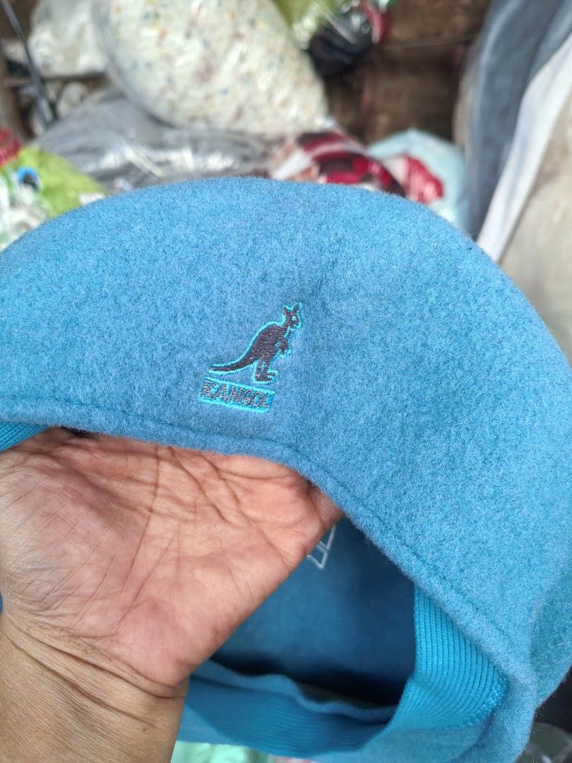 Kangol Wool 504 Cap Medium Blue (Category: Caps & Hats) located in Paranaque City. Submitted by furugiyafinds (Listing ID 1467694912, Image 2). Description: - Brand: Kangol - Style: Classic 504 Flat Cap - Color: Bright Blue - Size: Medium - Material: 100% Pure New Wool - Features: Iconic embroidered kangaroo logo on the back and comfortable ribbed sweatband - Origin: Designed in Britain.