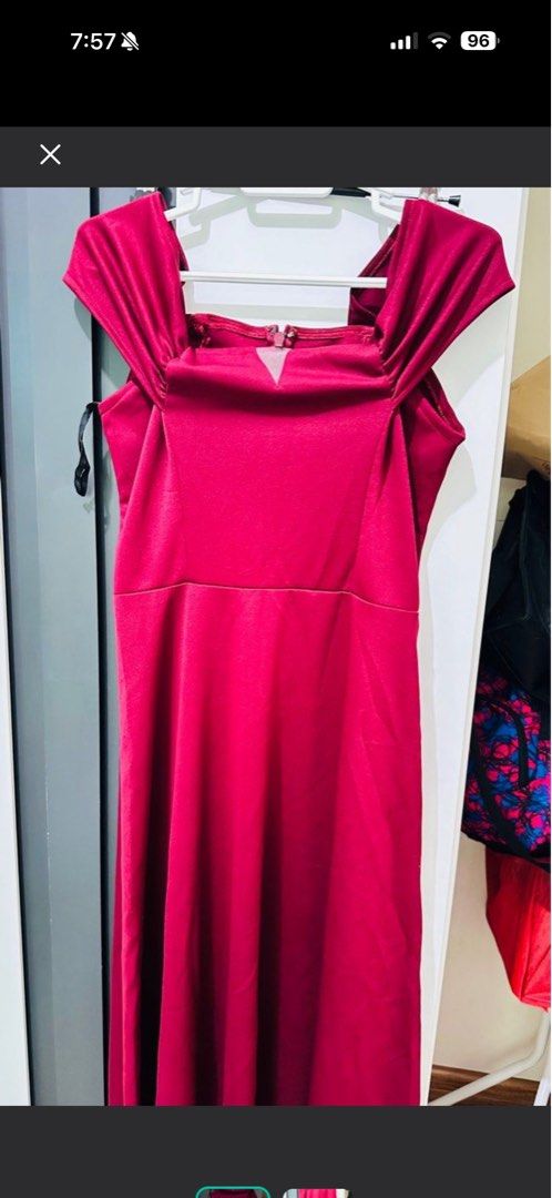 Karimadon Red Off-Shoulder Long Gown( stretchable) (Category: Dresses) located in Dasmarinas. Submitted by findfindspreloved_14 (Listing ID 1467680588, Image 1). Description: - Color: Deep red - Length: long - Neckline: Square neckline with a small cutout detail near the top zipper - Sleeves: Draped off-shoulder sleeves - Fit: Fitted bodice, flared bottom - Material: Smooth fabric - Condition: Clean and ready to wear.