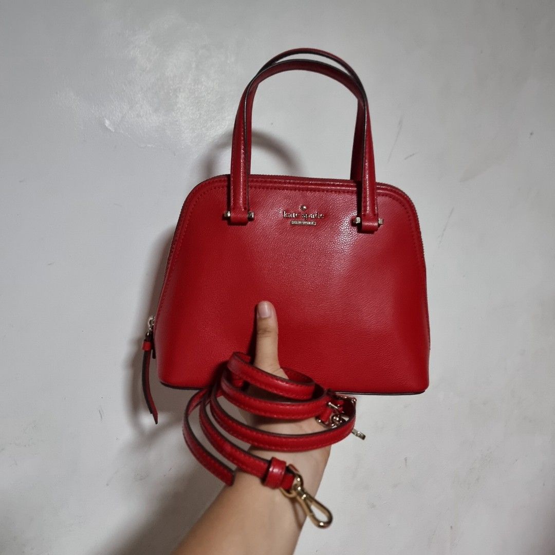 Kate Spade 2way Bag (Category: Cross-body Bags) located in Manila. Submitted by fashiondera. (Listing ID 1467643277, Image 1). Description: - Kate Spade red handbag - Top handle and detachable shoulder strap - Interior with small pocket RFS: letting go of my collections.