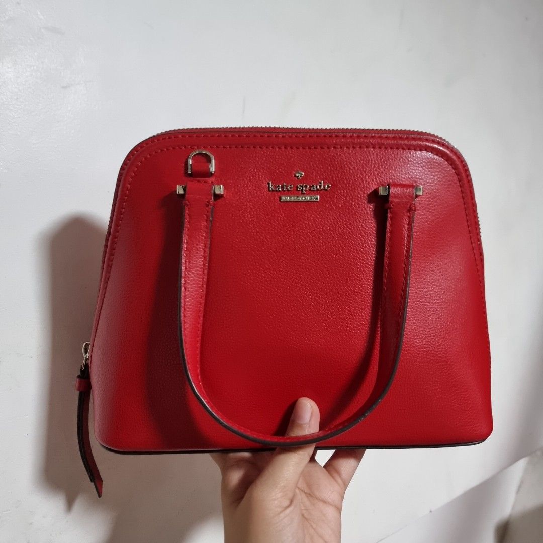 Kate Spade 2way Bag (Category: Cross-body Bags) located in Manila. Submitted by fashiondera. (Listing ID 1467643277, Image 2). Description: - Kate Spade red handbag - Top handle and detachable shoulder strap - Interior with small pocket RFS: letting go of my collections.