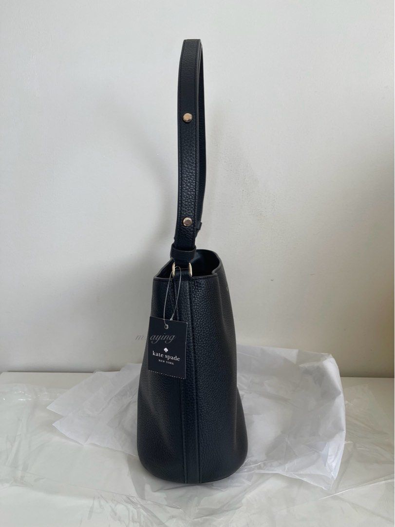 Kate Spade Julia 2-way Bucket Bag (Category: Shoulder Bags) located in Mandaluyong City. Submitted by momandbabystuffph (Listing ID 1467603602, Image 3). Description: Brand new Adjustable strap can be worn as crossbody or over the shoulder Size: Medium Dimension: • Height: 9.2 inches • Bottom Width: 9.08 inches • Top Width: 8.24 inches • Depth/Length: 5.2 inches • Strap Drop: 11 5/8 inches at its shortest length • Material: Pebbled leather with t