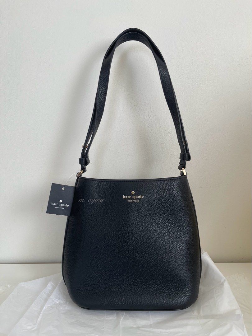 Kate Spade Julia 2-way Bucket Bag (Category: Shoulder Bags) located in Mandaluyong City. Submitted by momandbabystuffph (Listing ID 1467603602, Image 1). Description: Brand new Adjustable strap can be worn as crossbody or over the shoulder Size: Medium Dimension: • Height: 9.2 inches • Bottom Width: 9.08 inches • Top Width: 8.24 inches • Depth/Length: 5.2 inches • Strap Drop: 11 5/8 inches at its shortest length • Material: Pebbled leather with t