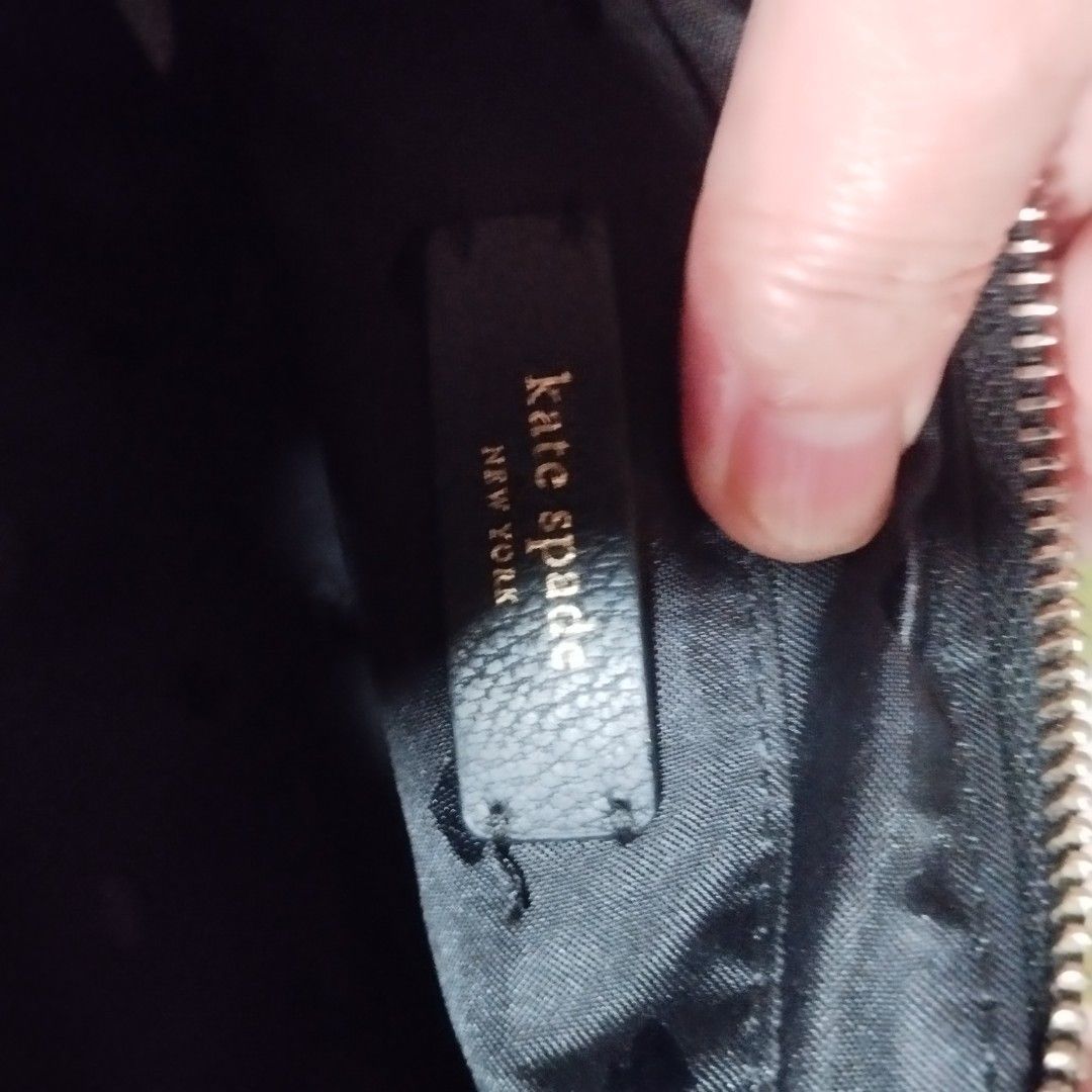 Kate spade quilted small bag (Category: Cross-body Bags) located in Manila. Submitted by lene48 (Listing ID 1467627576, Image 3). Description: - Brand: Kate Spade New York - Color: Classic Black - Material: Quilted leather with soft texture - Hardware: Gold-tone logo and chain strap accents - Design: Chevron quilted pattern with secure zip closure - Condition: Well-maintained, pre-loved in great shape - Size: Compact small bag, ideal for daily es
