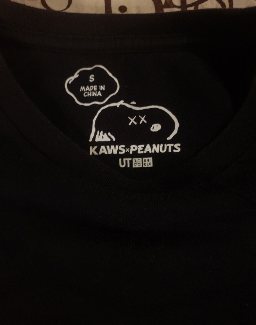 Kaws x peanuts x uniqlo (Category: Tshirts & Polo Shirts ) located in San Fernando. Submitted by retro.district. (Listing ID 1467821130, Image 3). Description: - Kaws x UT x peanuts pocket tee - Size: Small - Condition: Excellent - No issue - Color Rate: 9.5/10 (as seen fadings in photos that is due to lighting).