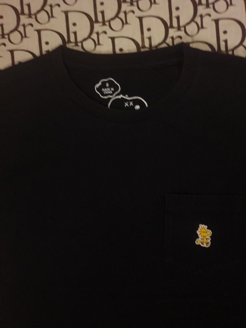 Kaws x peanuts x uniqlo (Category: Tshirts & Polo Shirts ) located in San Fernando. Submitted by retro.district. (Listing ID 1467821130, Image 2). Description: - Kaws x UT x peanuts pocket tee - Size: Small - Condition: Excellent - No issue - Color Rate: 9.5/10 (as seen fadings in photos that is due to lighting).