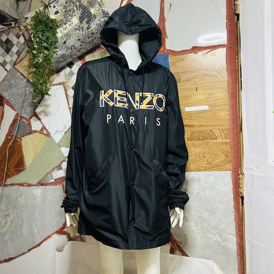 Kenzo coach jacket (Category: Luxury Apparel) located in Baguio. Submitted by kckc_luxury (Listing ID 1467754113, Image 1). Description: 🌸 TINY PINK SPOTS ARE LENS DAMAGE, NOT CLOTH STAINS ————————— ❗️KINDLY READ BEFORE MAKING AN OFFER❗️ LISTING DETAILS size:Large width x length (inches):25x31 condition: EXCELLENT --- MOP: Gcash / BPI MOD: J&T / JRS LOCATION: Baguio City --- NOTE: • Manage your expectations • Photos did not go under any edit but