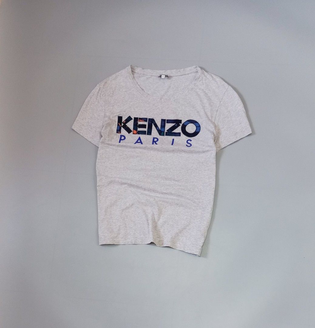 Kenzo Paris Patchwork Logo Grey T-Shirt (Category: Activewear) located in Cebu City. Submitted by MrLiks_123 (Listing ID 1467623054, Image 2). Description: Kenzo pariz embroidered patch work gray shirt Large womens size Fit also to men small to Med Width 20 / length 24½ Excellent condi! Cebu location Dm🙇.