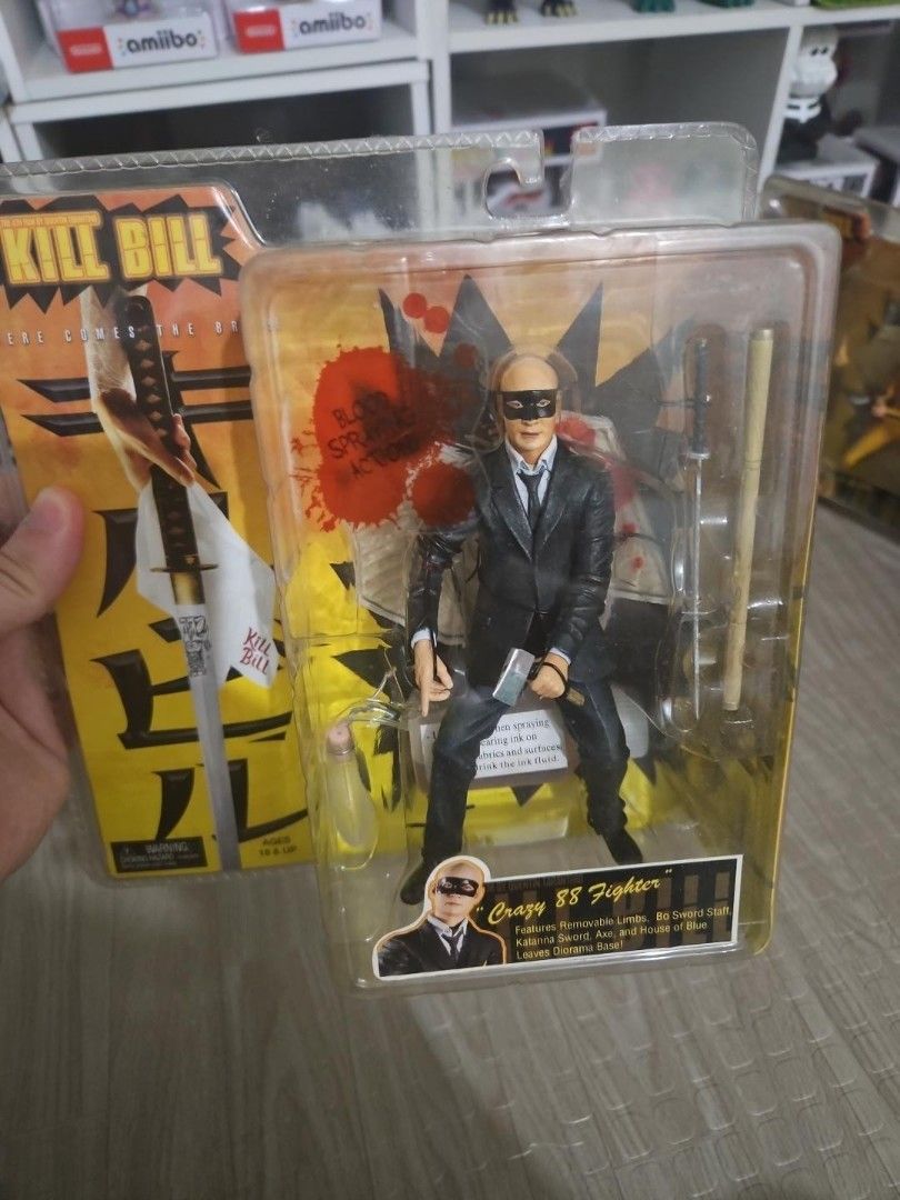 Kill Bill Action Figure Set Crazy 88 The Bride (Category: Figurines & Statues) located in Binan City. Submitted by davyltnh (Listing ID 1467740124, Image 2). Description: - Complete Kill Bill action figure collection in original packaging - Includes The Bride in yellow tracksuit, Go-Go, Crazy 88 fighters, and the Crazy 88 Director (SDCC Exclusive) - Features fun blood-spraying action effects - Comes with interchangeable weapons like katanas and a